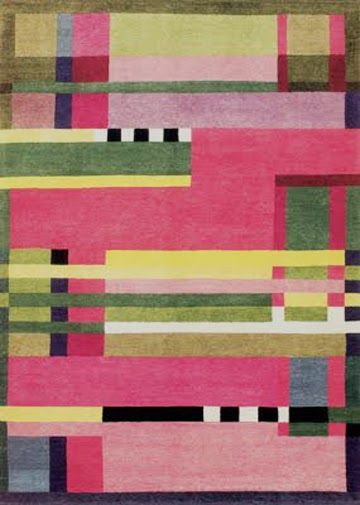 A colorful quilt by Bauhaus textile artist Gunta Stötzl